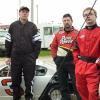 Mike Mayer, Mike Baum, and Cody Erdmann listen intensely to the drivers meeting.

